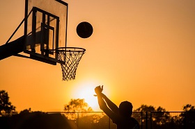 Playing basketball