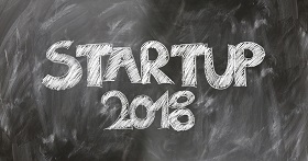 A Board with Startup 2018 written on it