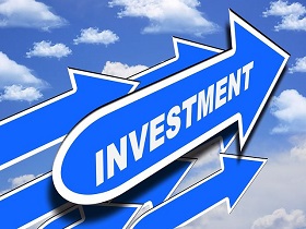 A signborard with 'investment' written on it
