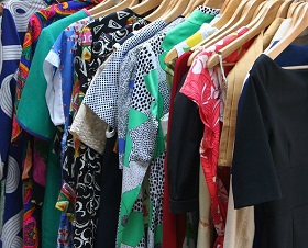 Dresses on hangers in a store