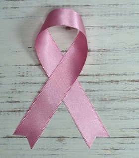 Pink ribbon symbol for cancer