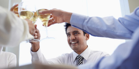 Businessman With Colleagues Toasting Wineglasses