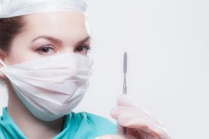 image of a woman with a syringe