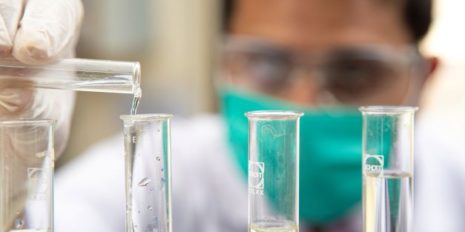scientist in a lab (pic from Unsplash)