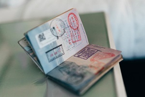 Visas on a passport, Unsplash