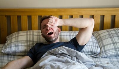 Yawning in bed 2 Pexels