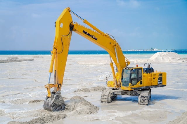 mining beach sand from Pexels