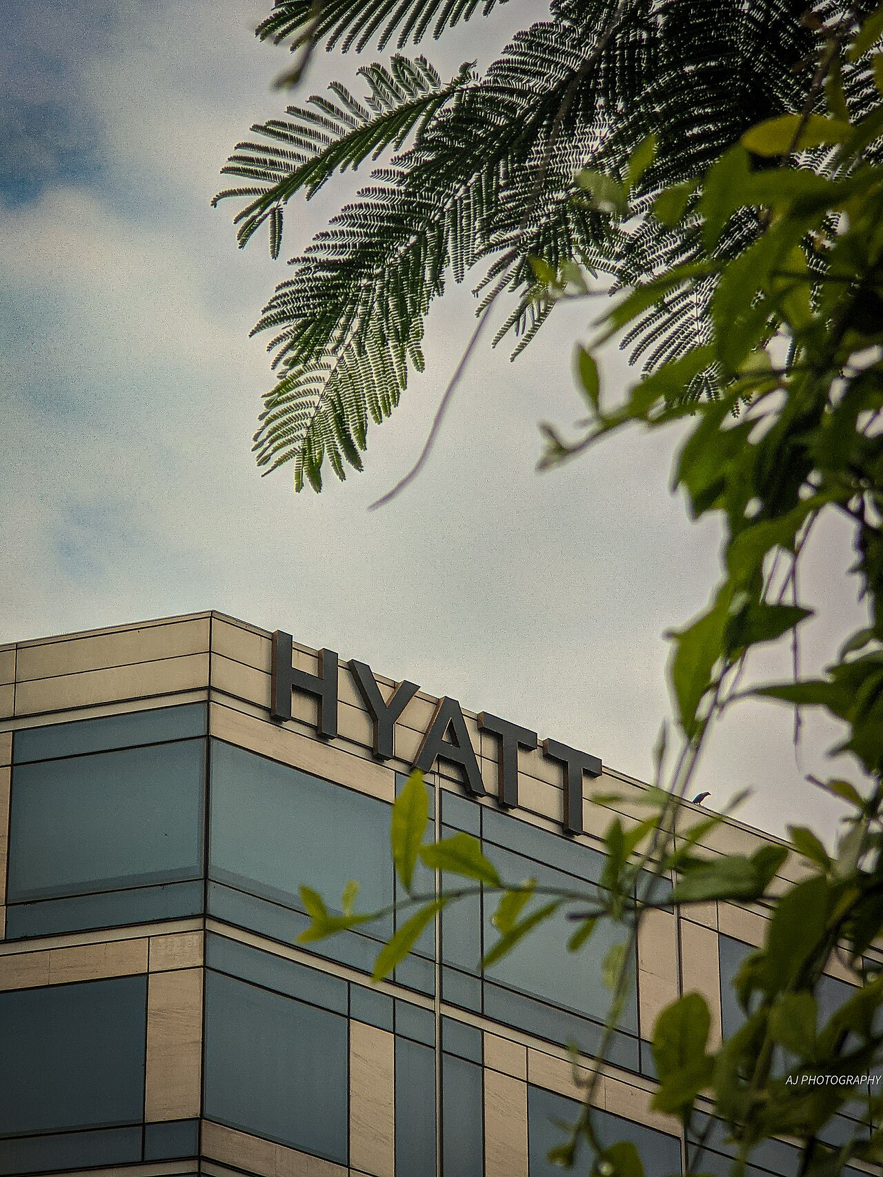 The Hyatt sign on top of the Hyatt Regency hotel in New Delhi