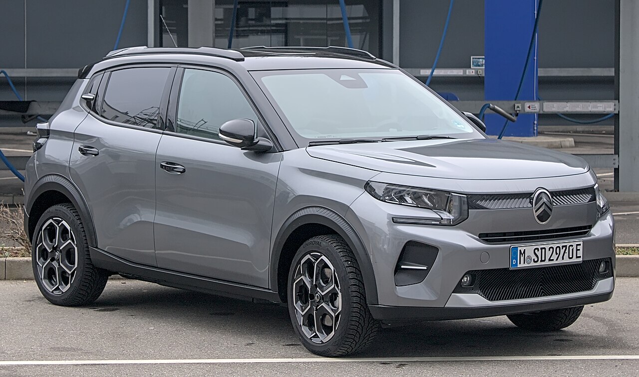 A grey Citroën ë-C3 compact SUV parked in Germany